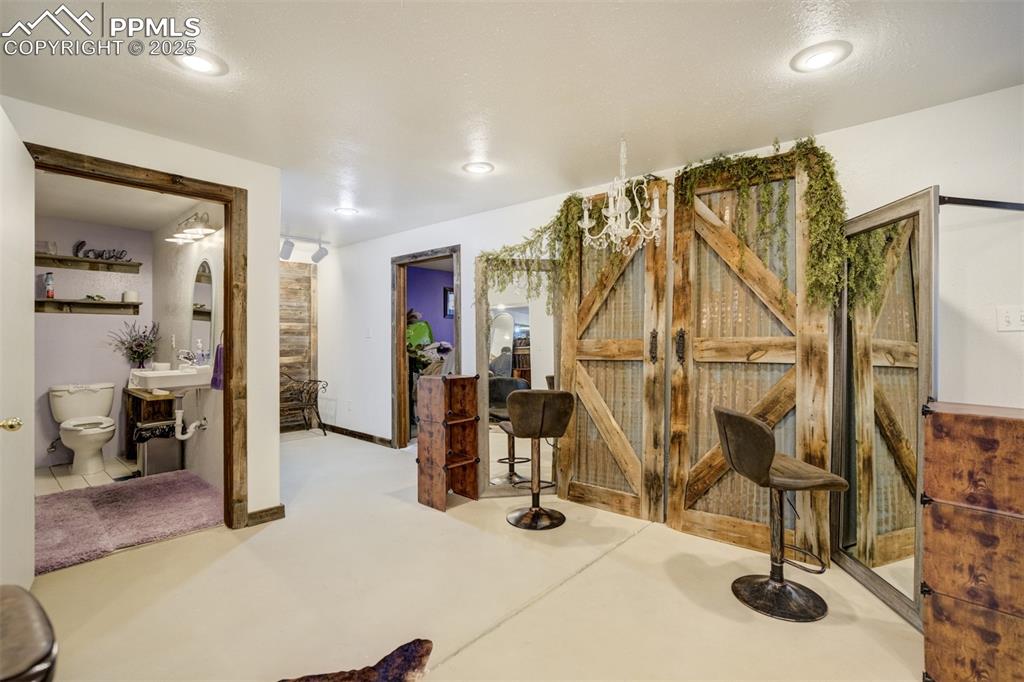 6275 Meridian Road Peyton, CO 80831 - Photo 22 of 50 a view of a room with gym equipment