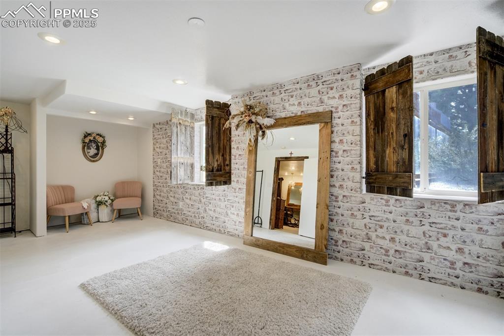 6275 Meridian Road Peyton, CO 80831 - Photo 23 of 50 a view of livingroom with furniture and windows
