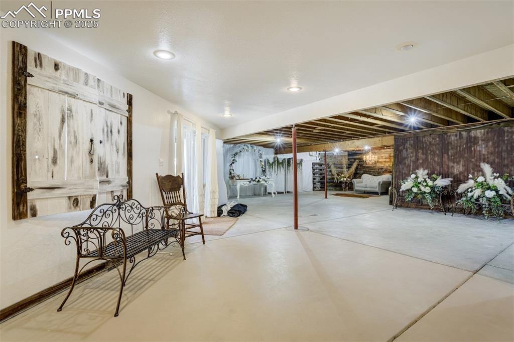6275 Meridian Road Peyton, CO 80831 - Photo 26 of 50 a living room with furniture and a large window