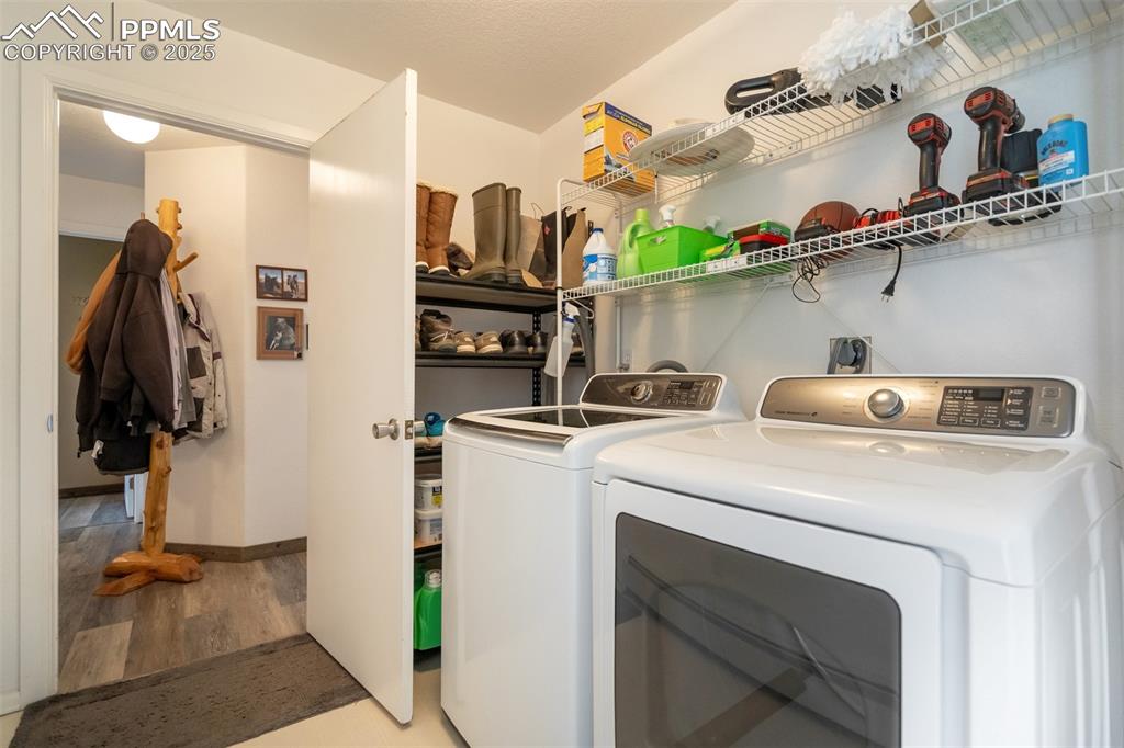 6275 Meridian Road Peyton, CO 80831 - Photo 30 of 50 a utility room with dryer and washer