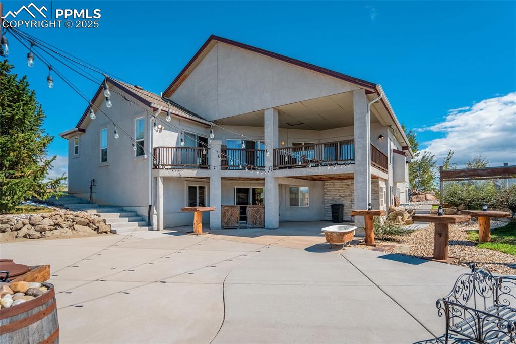 6275 Meridian Road Peyton, CO 80831 - Photo 37 of 50 a view of a house with roof and sitting area