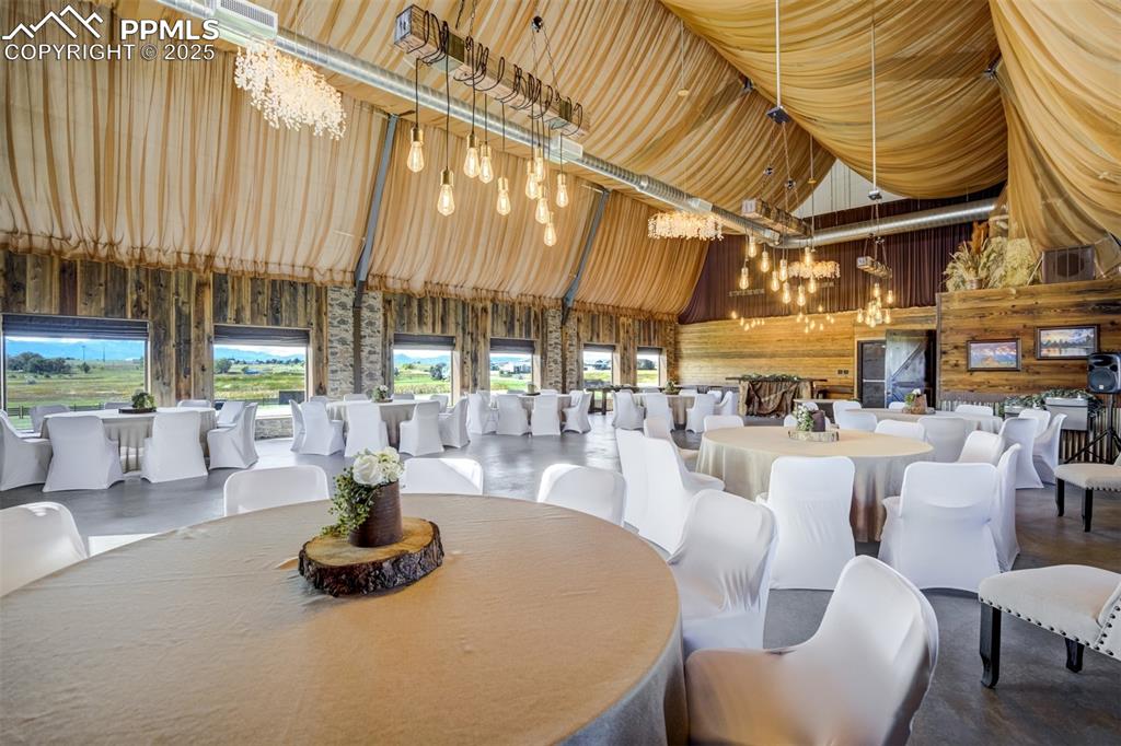 6275 Meridian Road Peyton, CO 80831 - Photo 45 of 50 a dining room with lots of tables and chairs