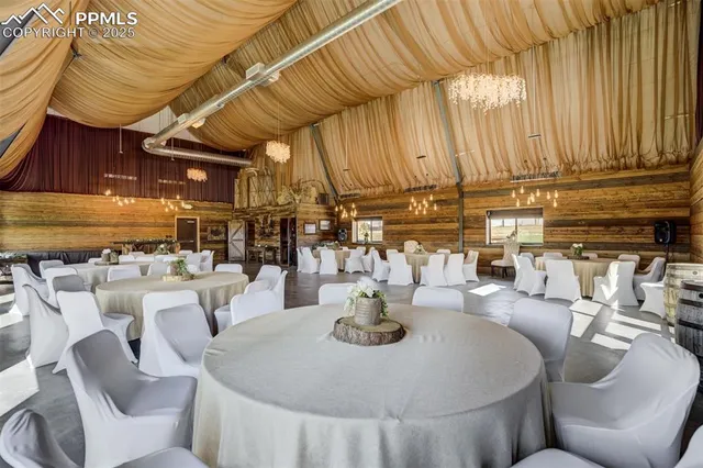 a large living room with large windows