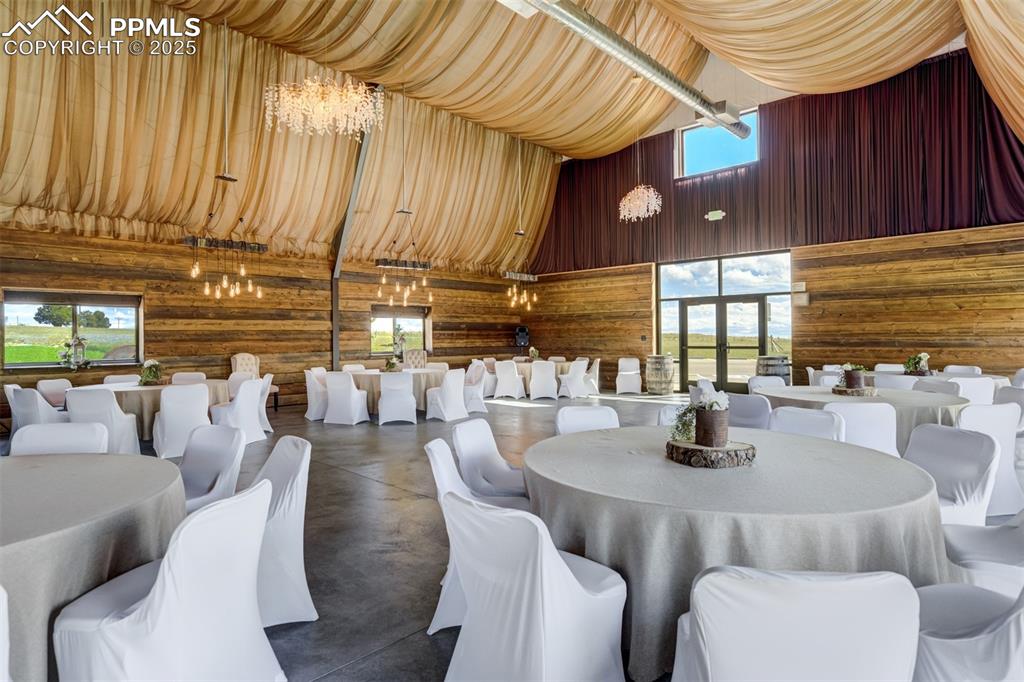 6275 Meridian Road Peyton, CO 80831 - Photo 47 of 50 a dining room with furniture and wooden floor