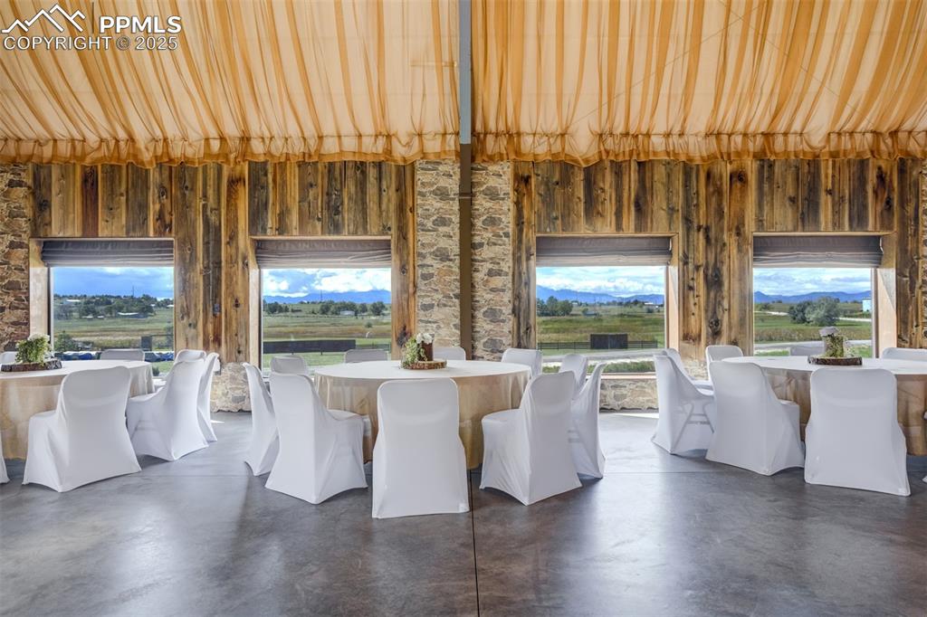 6275 Meridian Road Peyton, CO 80831 - Photo 48 of 50 a large living room with large windows