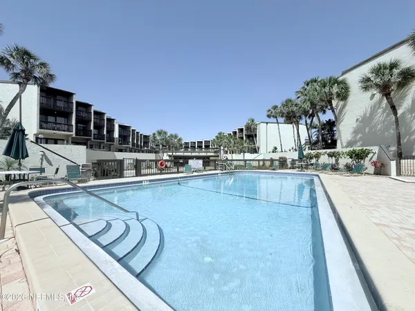 swimming pool view with a outdoor space
