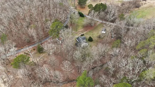a backyard of a house with lots of green space