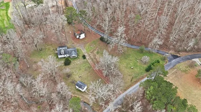 a backyard of a house with lots of green space