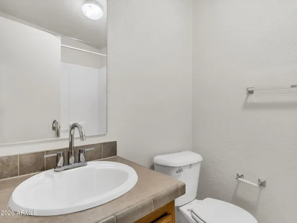 a bathroom with a sink and a toilet