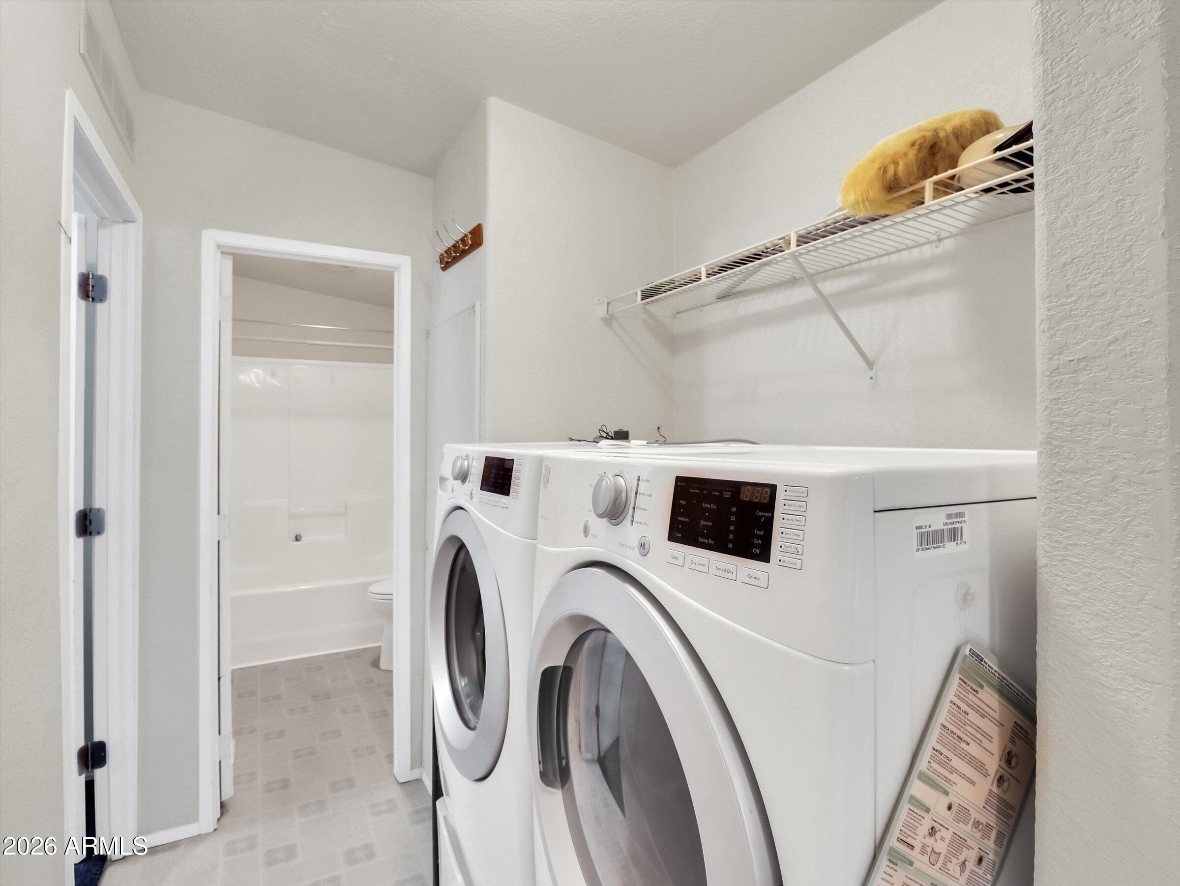 301 South Signal Butte Road, Unit 827 Apache Junction, AZ 85120 - Photo 15 of 29 past kitchen down hall - laundry