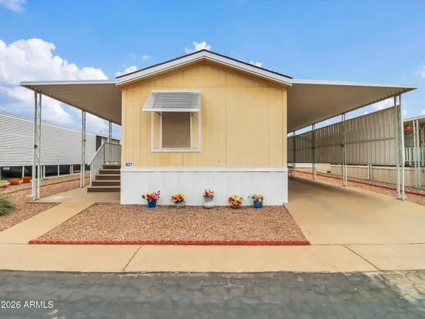 a front view of a house with a garage