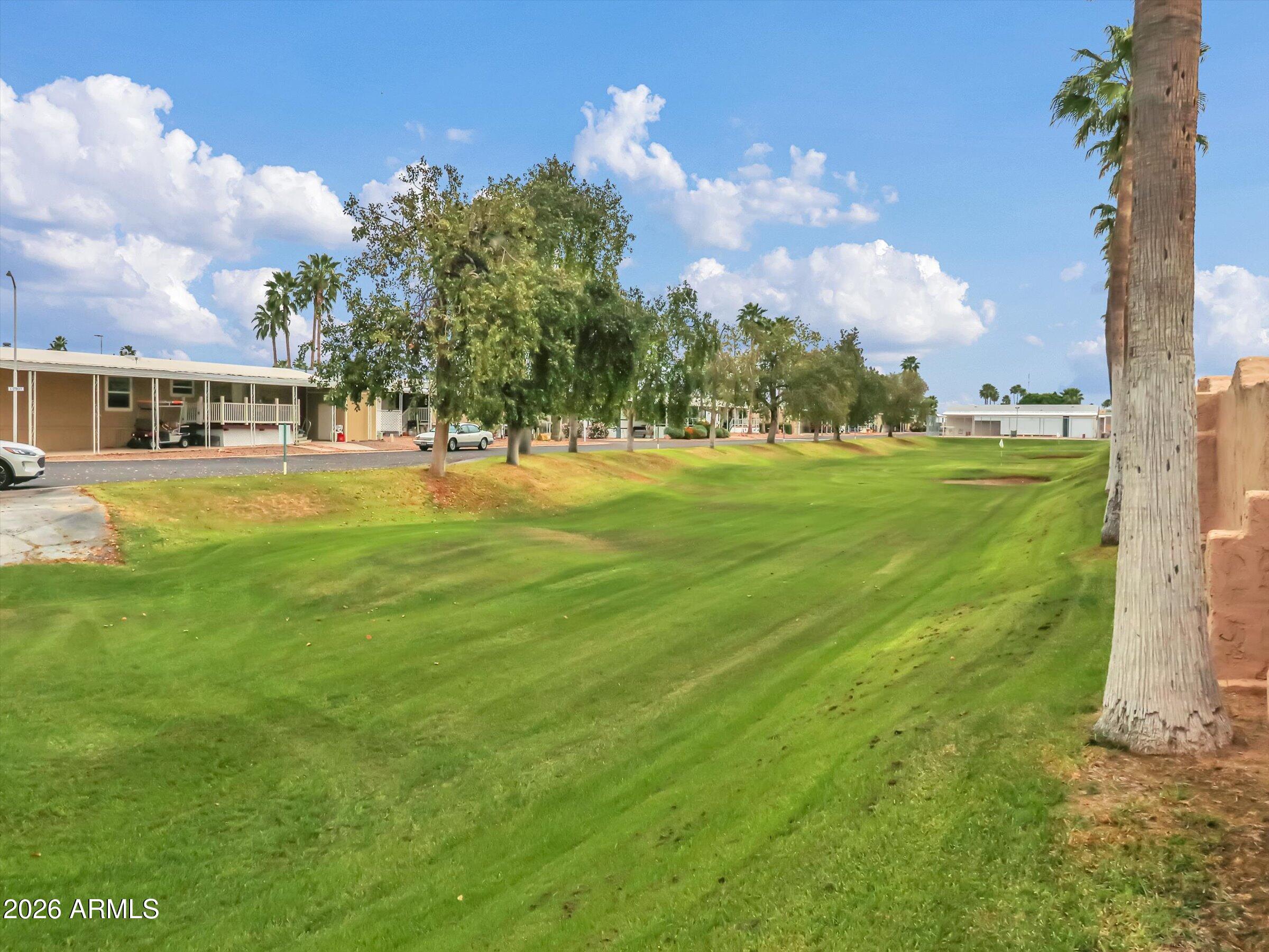 301 South Signal Butte Road, Unit 827 Apache Junction, AZ 85120 - Photo 25 of 29 Putting Green in the community!