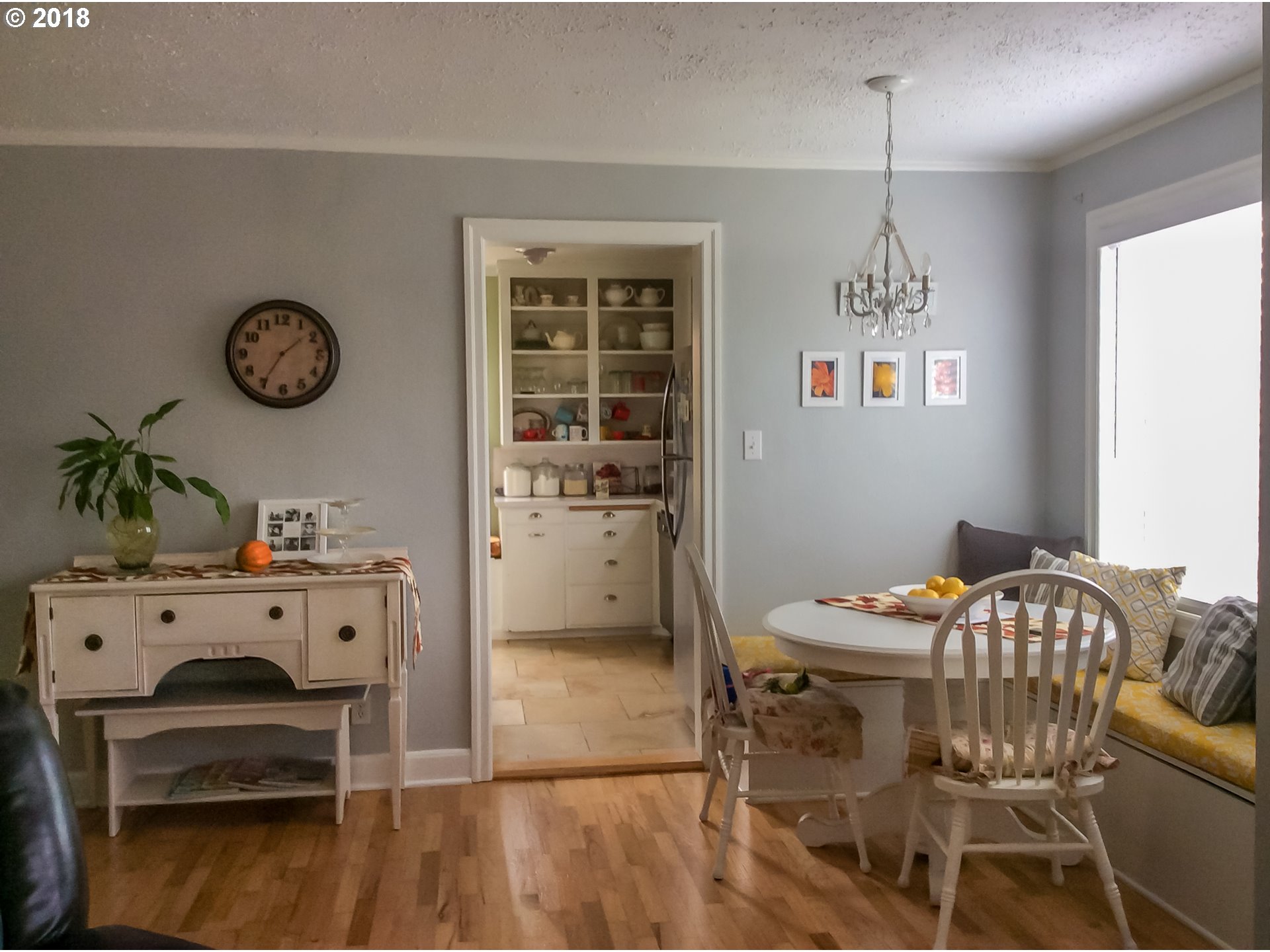 551 6th Street Springfield, OR 97477 - Photo 4 of 12 a view of a dining room with furniture window and wooden floor