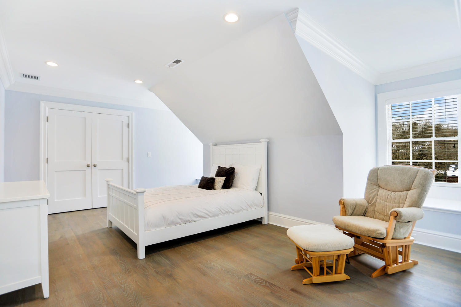 50 White Oak Shade Road New Canaan, CT 06840 - Photo 30 of 38 a bedroom with furniture and a window