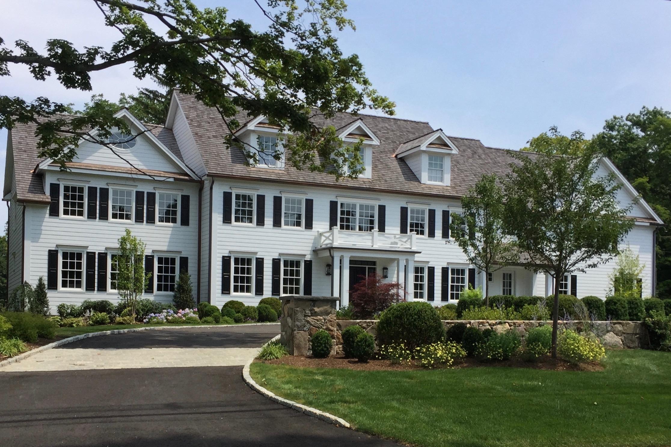 50 White Oak Shade Road New Canaan, CT 06840 - Photo 38 of 38 a front view of a house with a yard