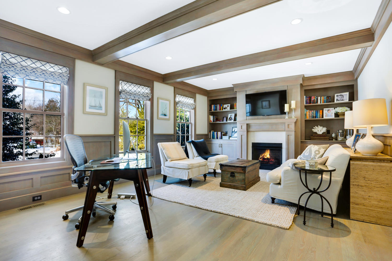 50 White Oak Shade Road New Canaan, CT 06840 - Photo 8 of 38 a living room with furniture a fireplace and a flat screen tv