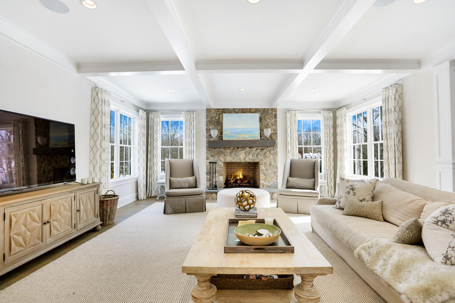 50 White Oak Shade Road New Canaan, CT 06840 - Photo 9 of 38 a living room with furniture flat screen tv and a fireplace