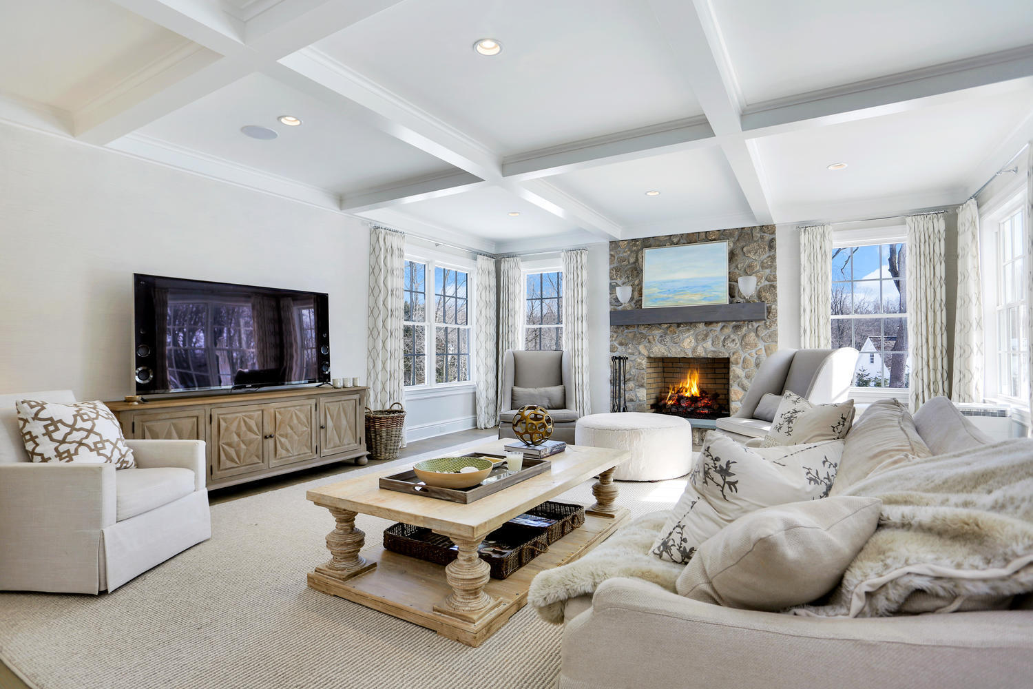 50 White Oak Shade Road New Canaan, CT 06840 - Photo 10 of 38 a living room with furniture a flat screen tv and a fireplace
