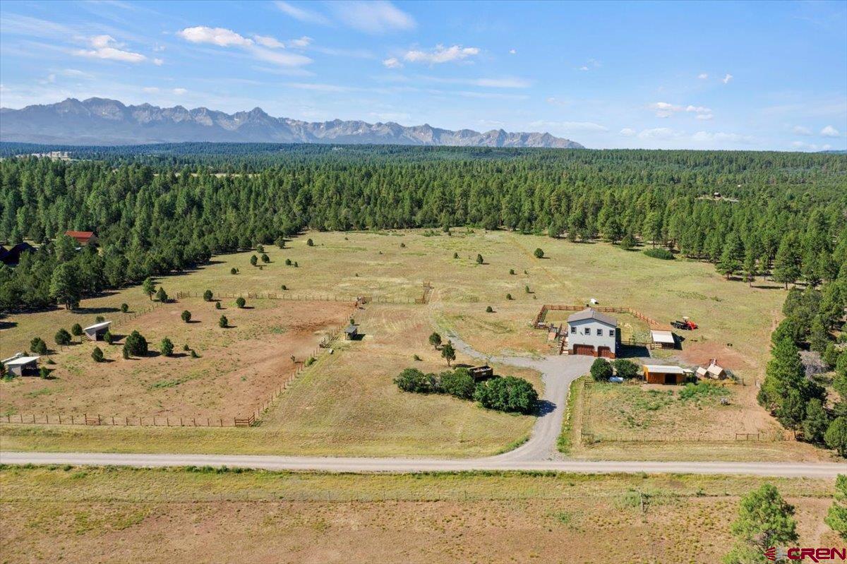 234 Thistle Drive Montrose, CO 81403 - Photo 12 of 39 a view of a swimming pool with a yard