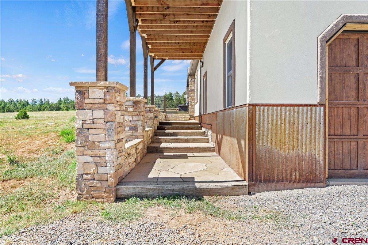 234 Thistle Drive Montrose, CO 81403 - Photo 27 of 39 a view of a building with a yard