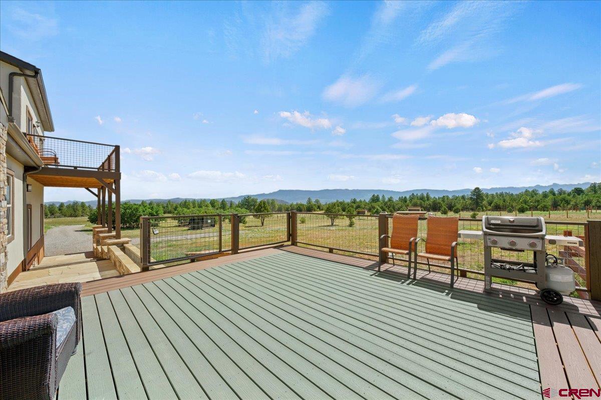 234 Thistle Drive Montrose, CO 81403 - Photo 35 of 39 a park with wooden benches and city view