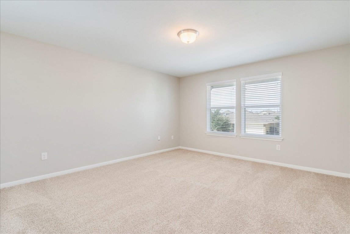 10317 Laurie Lane Austin, TX 78747 - Photo 12 of 35 an empty room with windows