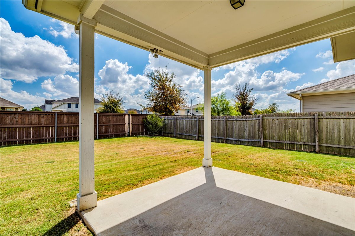 10317 Laurie Lane Austin, TX 78747 - Photo 24 of 35 Fenced backyard featuring a patio area