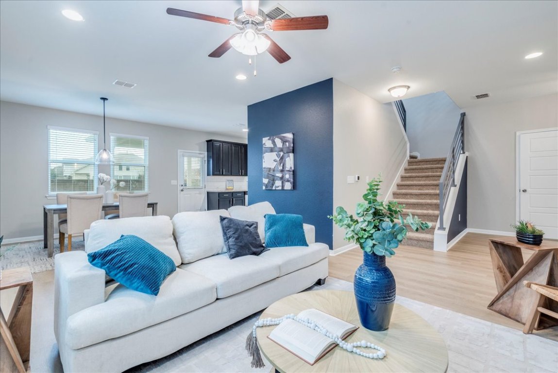 10317 Laurie Lane Austin, TX 78747 - Photo 3 of 35 a living room with furniture potted plant and a chandelier