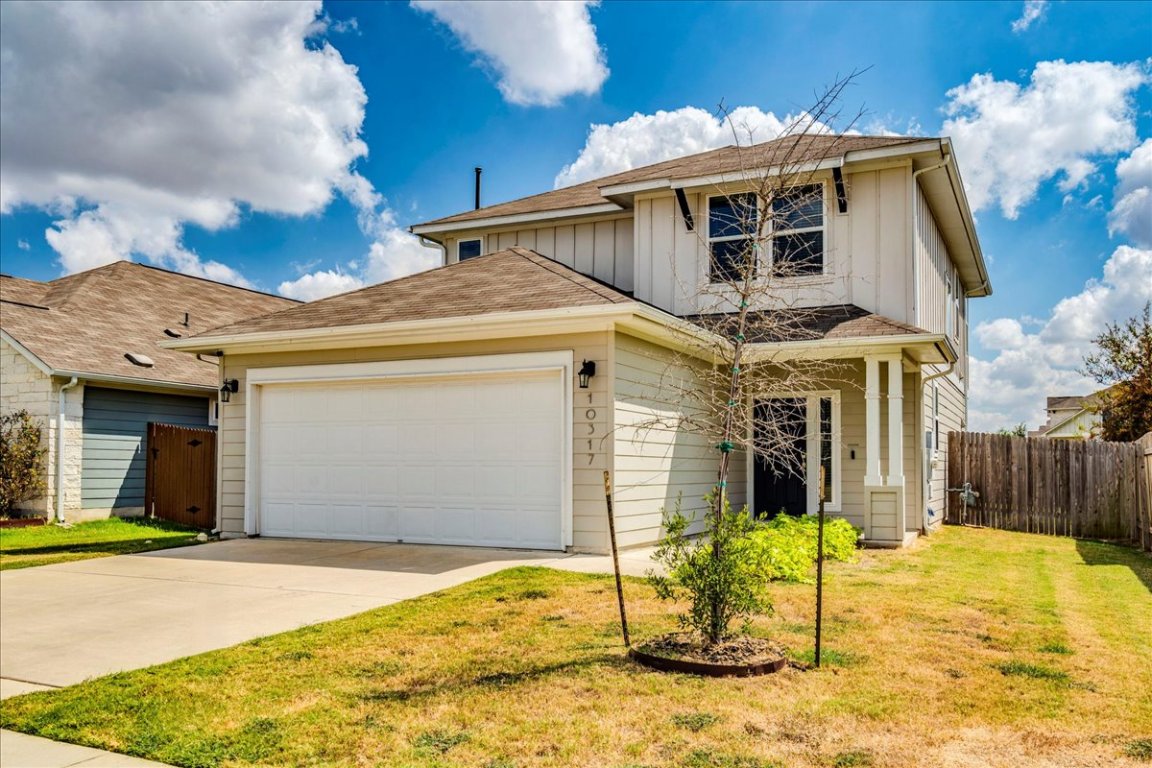 10317 Laurie Lane Austin, TX 78747 - Photo 31 of 35 a front view of a house with a yard