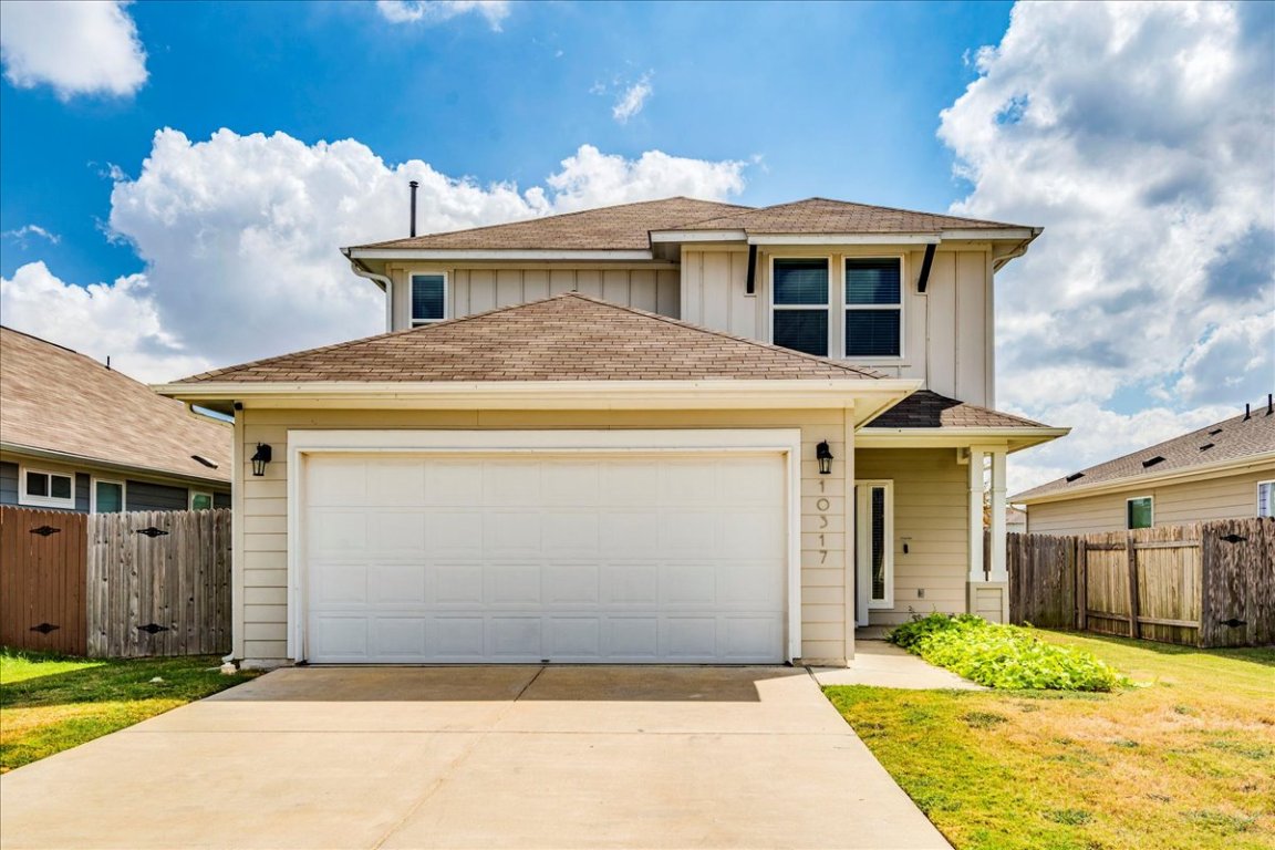 10317 Laurie Lane Austin, TX 78747 - Photo 32 of 35 a front view of a house with a yard