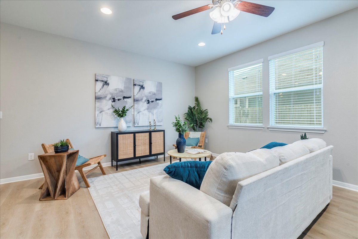 10317 Laurie Lane Austin, TX 78747 - Photo 7 of 35 Living area featuring light wood-style floors, recessed lighting, and ceiling fan