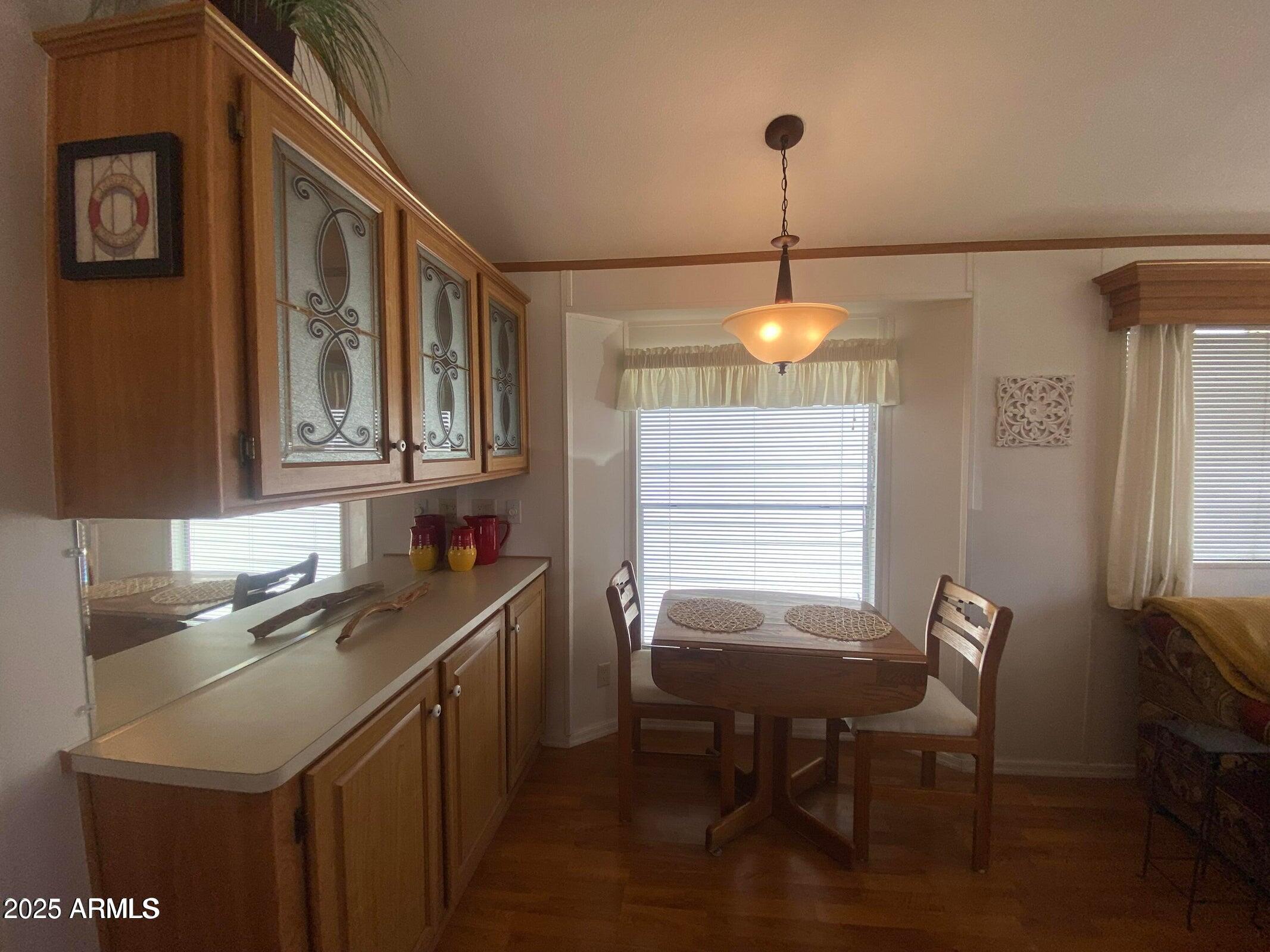 1426 South Havasupai Drive Apache Junction, AZ 85119 - Photo 12 of 32 a view of a dining room and chairs