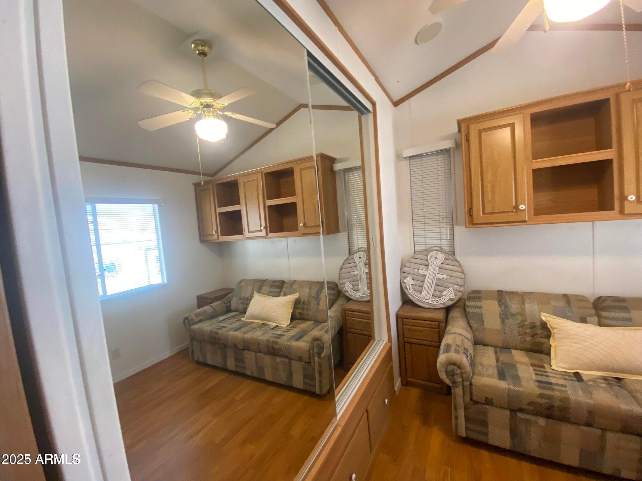 1426 South Havasupai Drive Apache Junction, AZ 85119 - Photo 19 of 32 a bedroom with furniture and a window