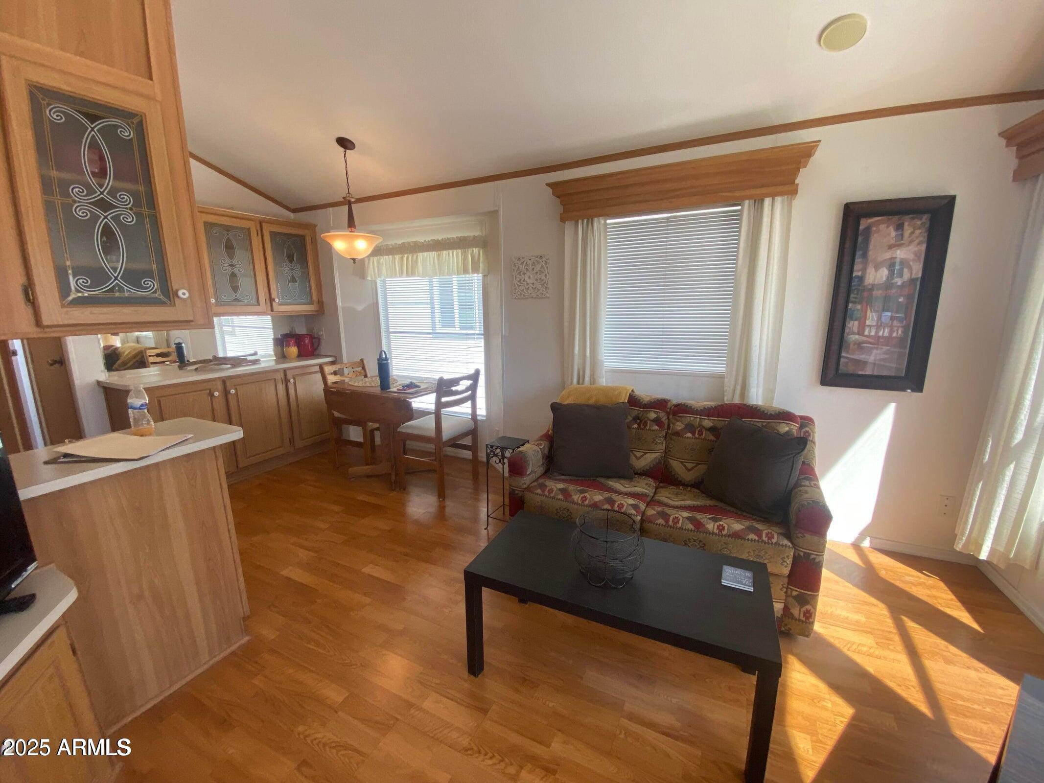 1426 South Havasupai Drive Apache Junction, AZ 85119 - Photo 2 of 32 a living room with furniture and a large window