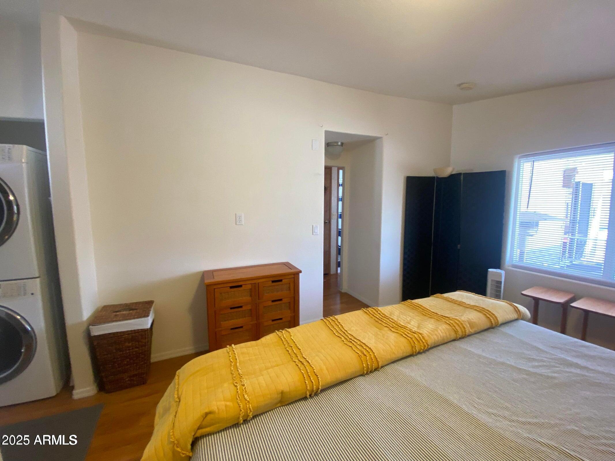 1426 South Havasupai Drive Apache Junction, AZ 85119 - Photo 23 of 32 a bedroom with a bed and a closet