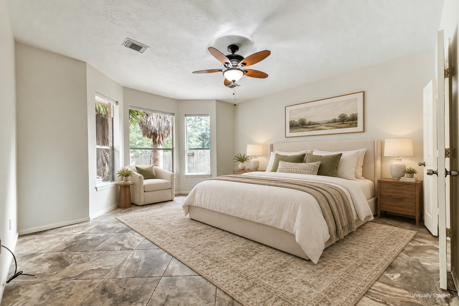 6338 Maple Spring Place Humble, TX 77346 - Photo 25 of 50 Virtually staged — Unwind in a bedroom filled with natural light and leafy backyard views. The window alcove offers a lovely setting for a reading chair, giving you a place to pause before starting or ending the day.