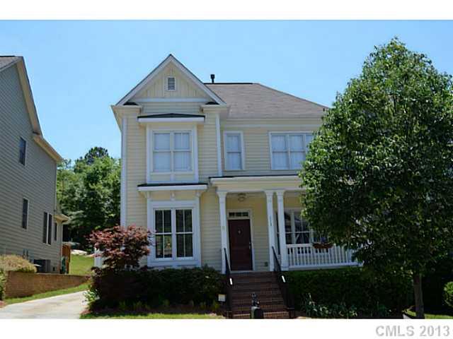 113 Mills Lane Fort Mill, SC 29708 - Photo 1 of 16 a front view of house with a garden