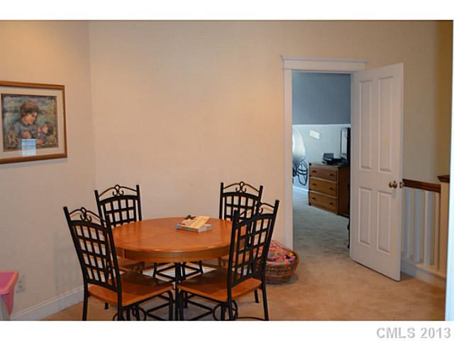 113 Mills Lane Fort Mill, SC 29708 - Photo 11 of 16 a view of a dining room with furniture