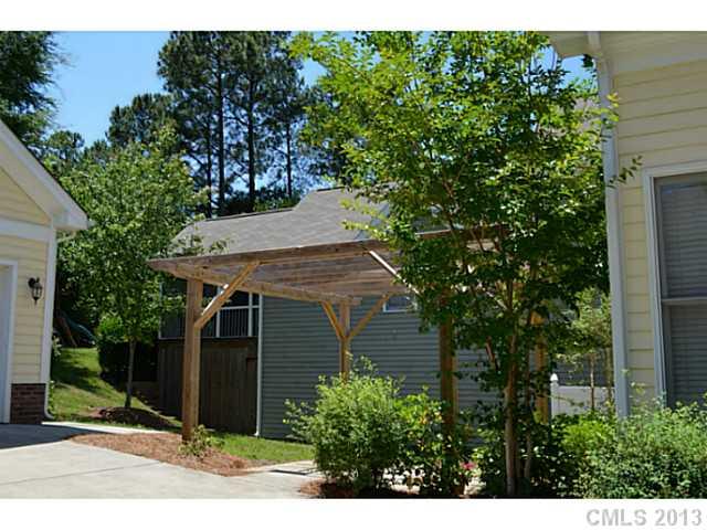 113 Mills Lane Fort Mill, SC 29708 - Photo 12 of 16 a view of a house with a tree
