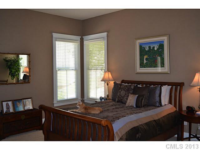 113 Mills Lane Fort Mill, SC 29708 - Photo 7 of 16 a bedroom with a bed and a window