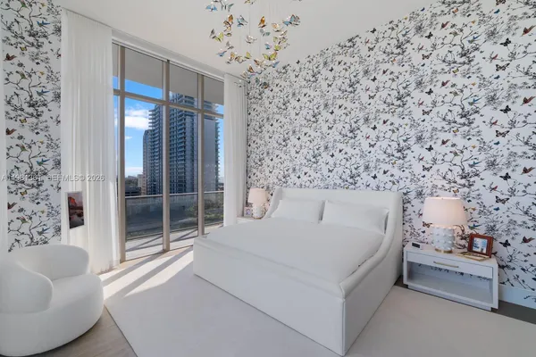 a view of balcony with furniture