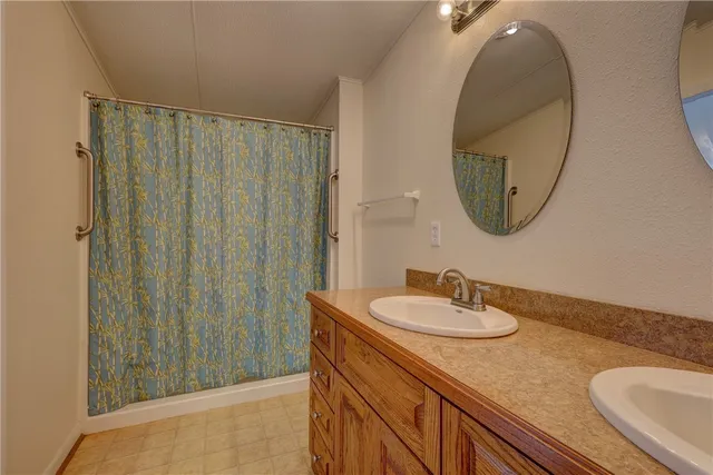 a bathroom with a toilet and a window