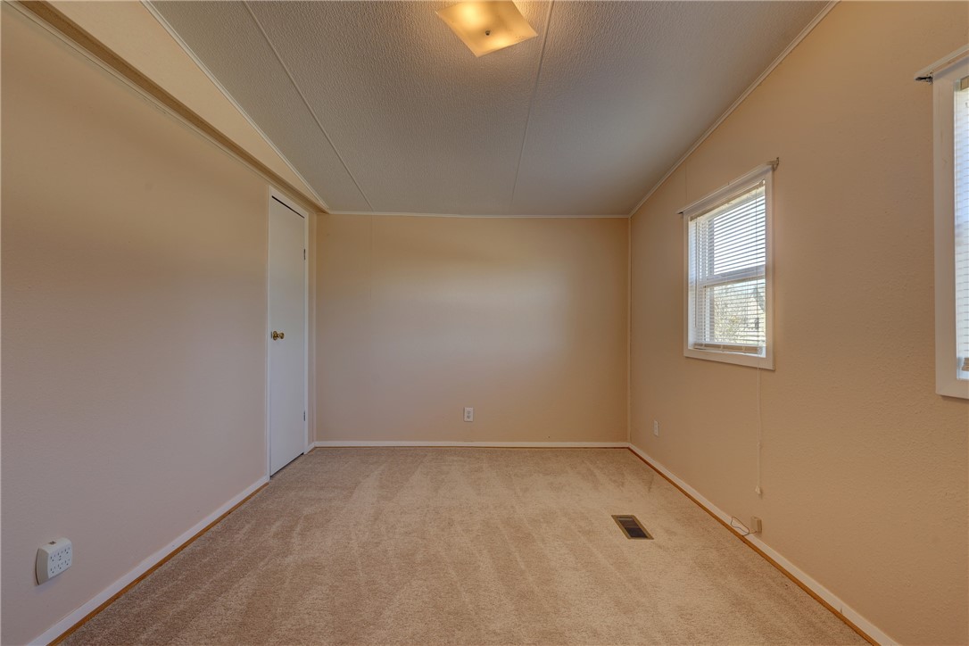 117 Denmark Street Walnut Springs, TX 76690 - Photo 20 of 40 a view of an empty room with a window
