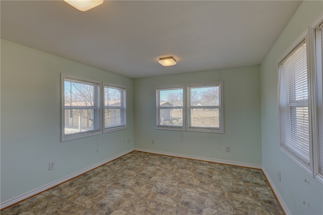 117 Denmark Street Walnut Springs, TX 76690 - Photo 25 of 40 an empty room with a window