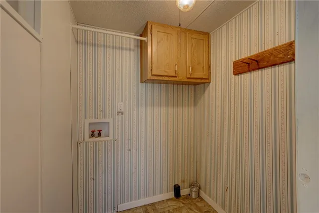 a front view of a house with parking area