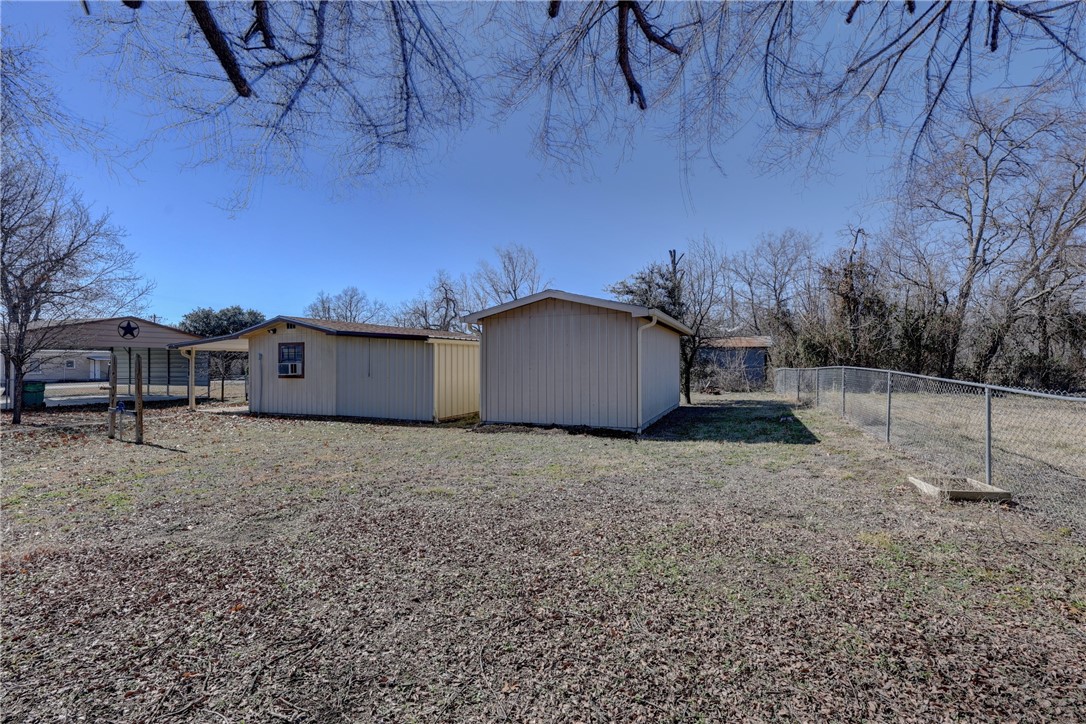117 Denmark Street Walnut Springs, TX 76690 - Photo 31 of 40 a view of a backyard