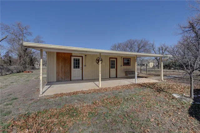 a view of a street in front of house