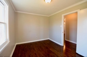 203 James Avenue Franklin, TN 37064 - Photo 13 of 26 an empty room with wooden floor and windows