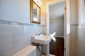 203 James Avenue Franklin, TN 37064 - Photo 10 of 26 a bathroom with a sink a toilet and shower
