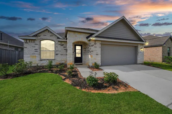 a kitchen with stainless steel appliances granite countertop a stove and a microwave